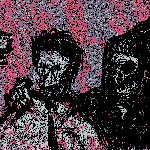 A fuzzy moving image of a hooded skeleton and a person posing for a photo.