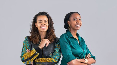 Portrait of Molemo Moiloa and Chao Tayiana Maina against a gray backdrop.