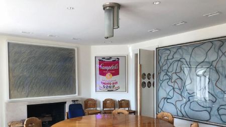 Untitled (1971) by Cy Twombly, Campbell’s Soup Can by Andy Warhol and Letter About Rocks #2 by Brice Marden in the dining room before the fire.