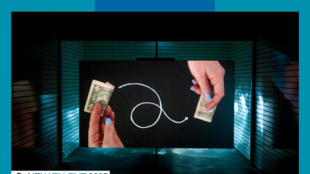 On a screen in a dark space, two light-skinned hands with periwinkle nails hold money; a drawn looping white arrow connects them.