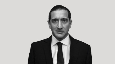 Black-and-white portrait of Shane Akeroyd.