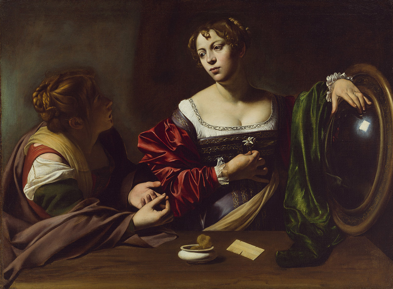 A dramatically lit baroque painting of two women. The central glowing figure holds a white flower to her chest and restes her hand on a reflective convex lens.