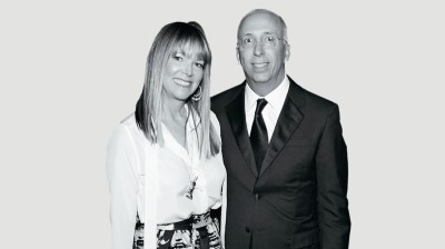 Black-and-white portrait of a white woman and a white man