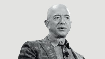 Black-and-white portrait of a bald white man