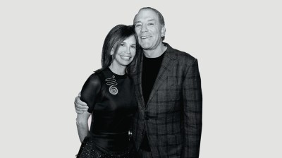 Black-and-white portrait of a middle-aged white woman and white man
