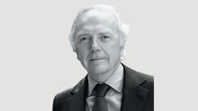 Black-and-white portrait of an elderly white man