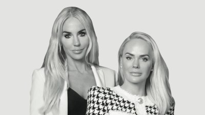 Black-and-white portrait of a two white women sisters.