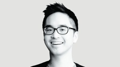 Black-and-white portrait of a young Asian man