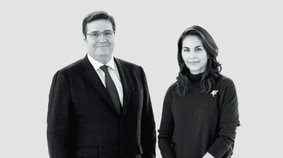 Black-and-white portrait of a middle-aged Mexican couple