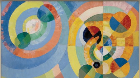 An abstract painting of two circular forms intersecting.