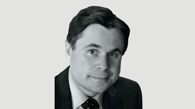 Black-and-white portrait of a middle-aged white man