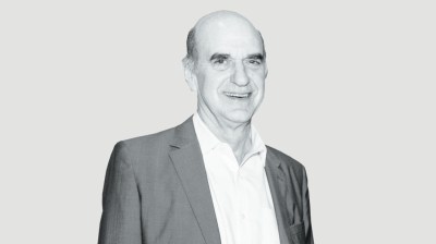 Black-and-white portrait of an older white man