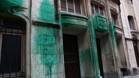 A photo shows green paint thrown on the walls of the Agoudas Hakehilos synagogue in Paris on May 31, 2025. The Shoah Memorial, two synagogues, and a restaurant in central Paris were sprayed with green paint overnight on May 30, 2025, according to police sources. (Photo by Thibaud MORITZ / AFP) (Photo by THIBAUD MORITZ/AFP via Getty Images)