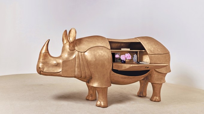 François-Xavier Lalanne's Grand Rhinocéros II (2003), a life-size sculptural gold patinated bronze, brass and leather desk in the shape of the animal. Image courtesy of Sotheby's.