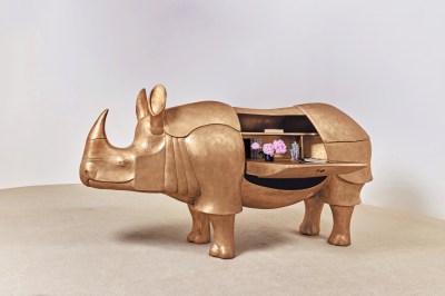 François-Xavier Lalanne's Grand Rhinocéros II (2003), a life-size sculptural gold patinated bronze, brass and leather desk in the shape of the animal. Image courtesy of Sotheby's.
