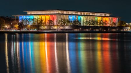 The exterior of the John F. Kennedy Center of the Performing Arts building reflected in the Potomac River, 2024, Washington, D.C.