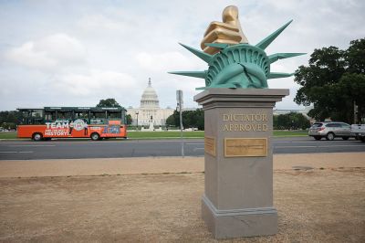 WASHINGTON, DC - JUNE 17: An anti-Trump art installation statue is seen in front of the U.S. Capitol on the National Mall on June 17, 2025 in Washington, DC. It's not known where the statue came from, which features a large "thumbs up" that is sitting on top of a broken Statue of Liberty with quotes surrounding the pedestal. (Photo by Kayla Bartkowski/Getty Images)