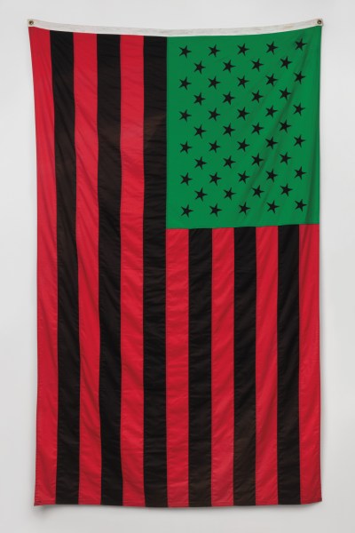 An American flag rendered in the colors of the Panafrican flag, so with red and black stribes, and a green square with red stars.