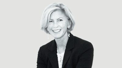 Black-and-white portrait of a middle-aged white woman