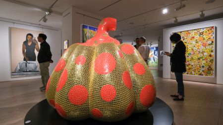 HONG KONG, CHINA - MARCH 20:  The "Pumpkin" sculpture by Japanese artist Yayoi Kusama is on display ahead of the Modern and Contemporary Auctions at Sotheby's Hong Kong Maison on March 20, 2025 in Hong Kong, China. (Photo by Chen Yongnuo/China News Service/VCG via Getty Images)