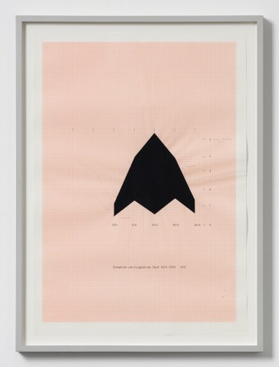 A drawing of a black shape on a pink-ish grid paper. 