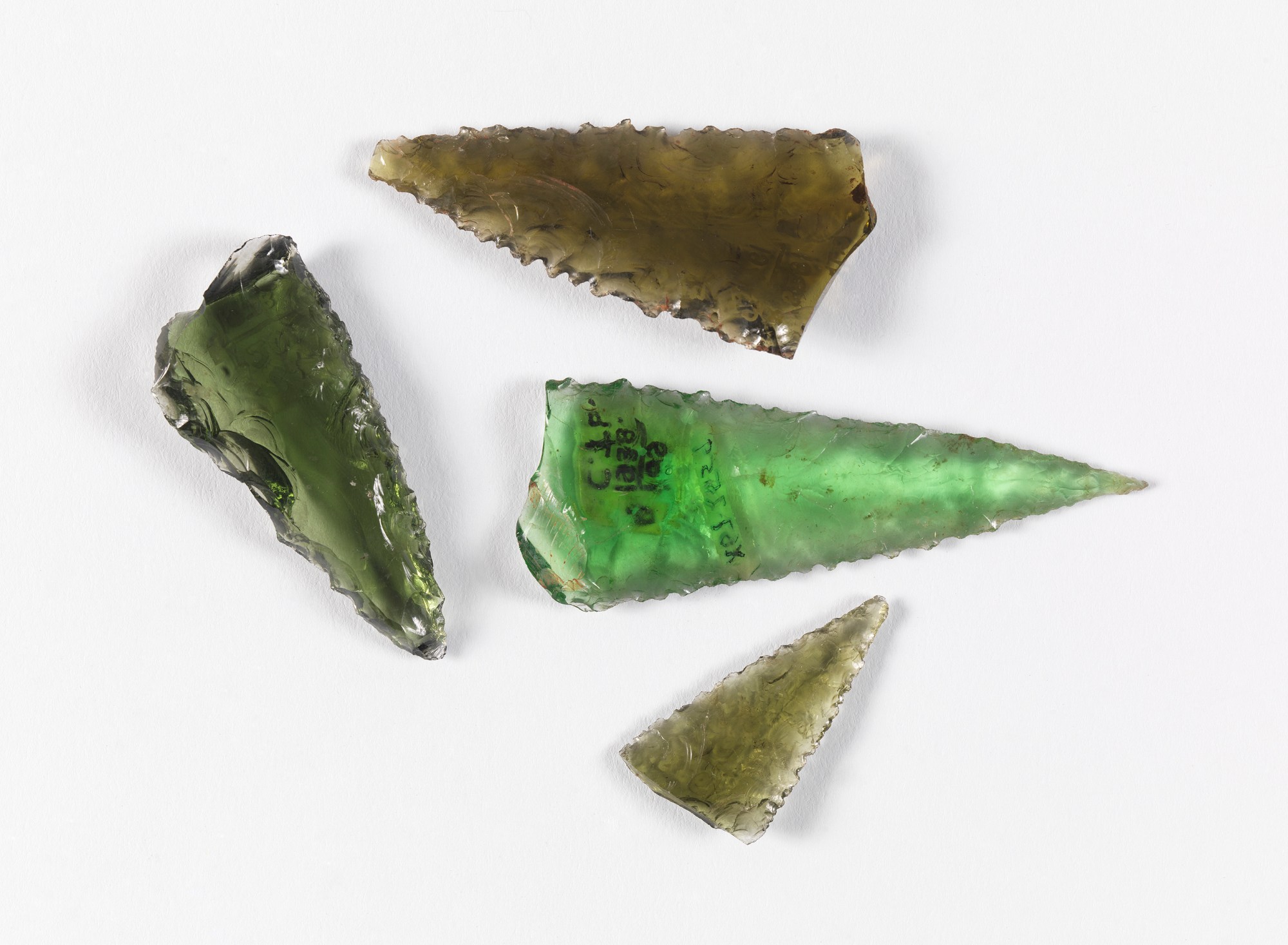 Four of the ten glass spearheads being returned by the Fowler Museum. Courtesy of the Fowler Museum, UCLA.