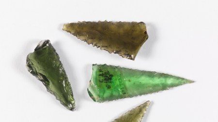 Four of the ten glass spearheads being returned by the Fowler Museum. Courtesy of the Fowler Museum, UCLA.