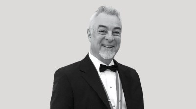 Black-and-white portrait of an older white man