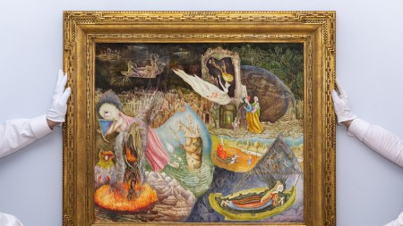 Two pairs of hands holding the frame of a painting portraying a phantasmagorical world.