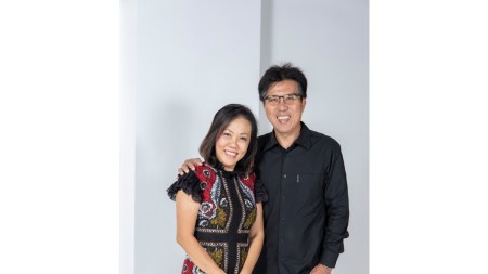 A portrait of an Asian woman and an Asian man.