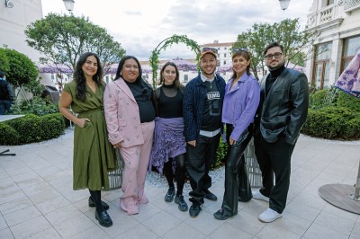 Six people pose for a photo in Venice, Italy.