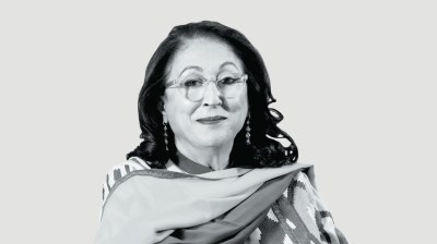 Black-and-white portrait of a middle-aged Indian woman in a sari