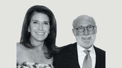 Black-and-white portrait of a middle-aged white woman and an older white man