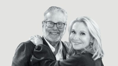 Black-and-white portrait of a middle-aged white man and woman