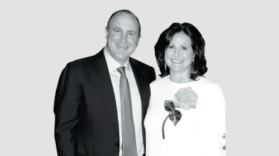 Black-and-white portrait of a middle-aged white man and woman