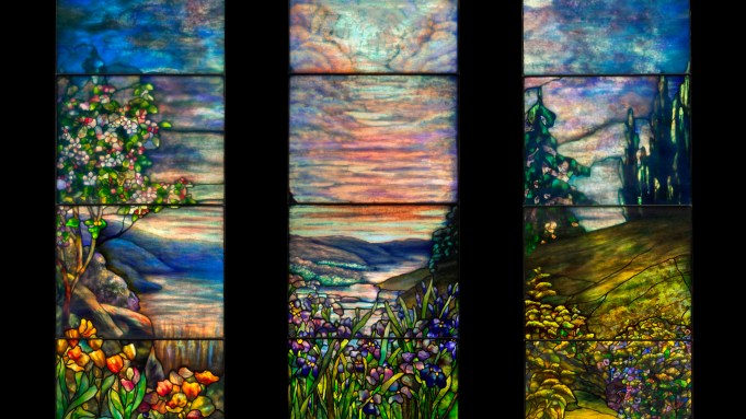 An image of the three-pane stained glass window The Goddard Memorial Window by Tiffany Studios which recently sold at a Christie's design auction on June 12, 2025.