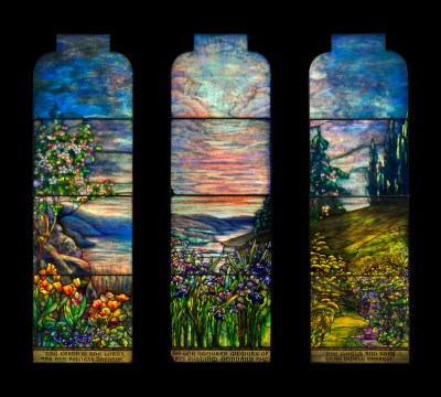An image of the three-pane stained glass window The Goddard Memorial Window by Tiffany Studios which recently sold at a Christie's design auction on June 12, 2025.