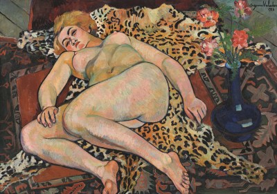 A painting of a nude woman lying on her back on a leopard skin.